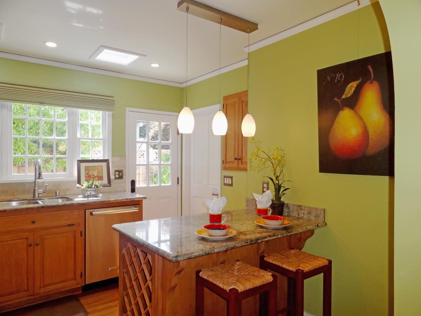16760 Magneson Loop Los Gatos, CA 95032 - Photo 7 of 20 a kitchen with a sink cabinets and wooden floor