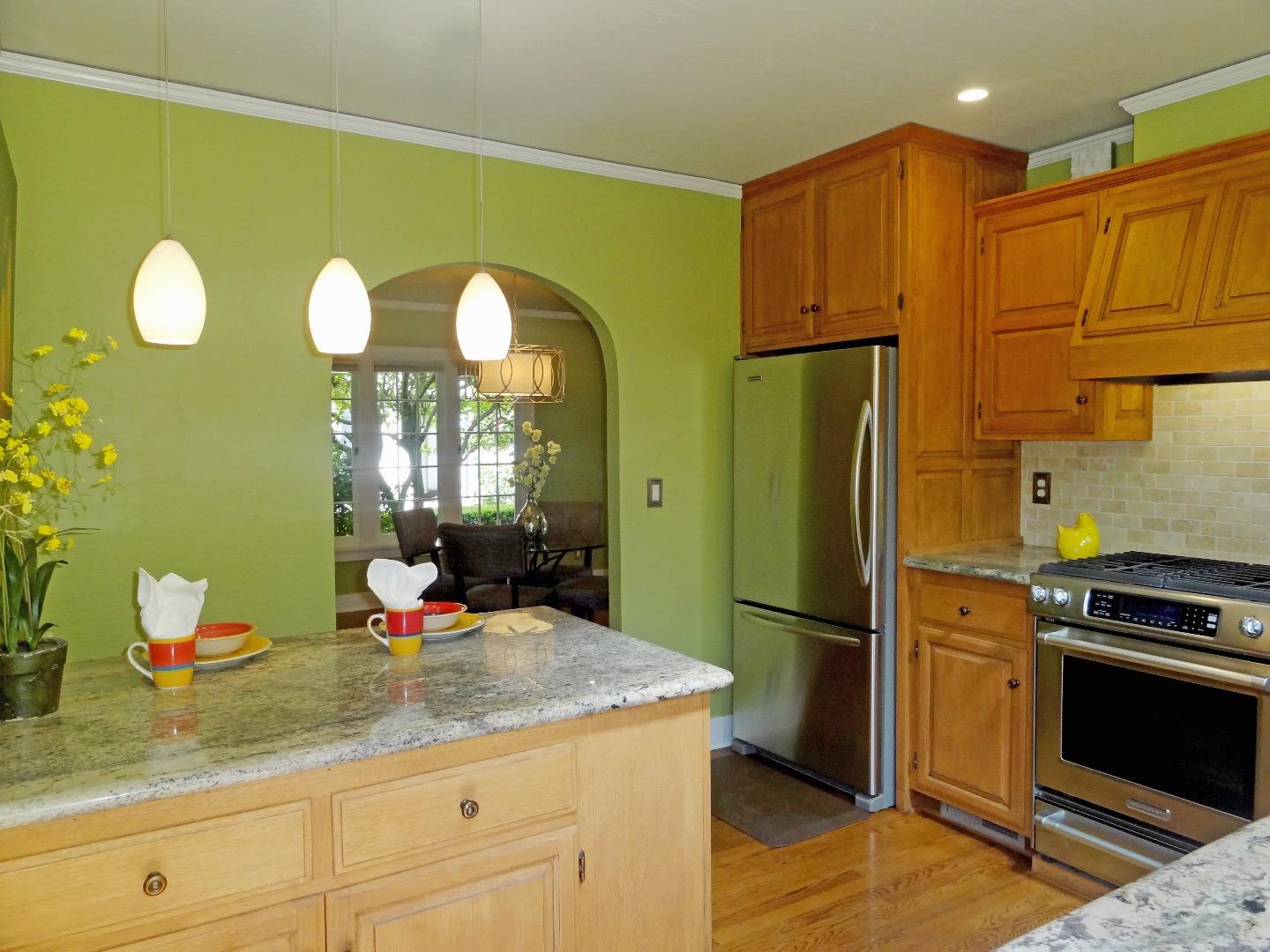 16760 Magneson Loop Los Gatos, CA 95032 - Photo 8 of 20 a kitchen with stainless steel appliances granite countertop a refrigerator sink and cabinets