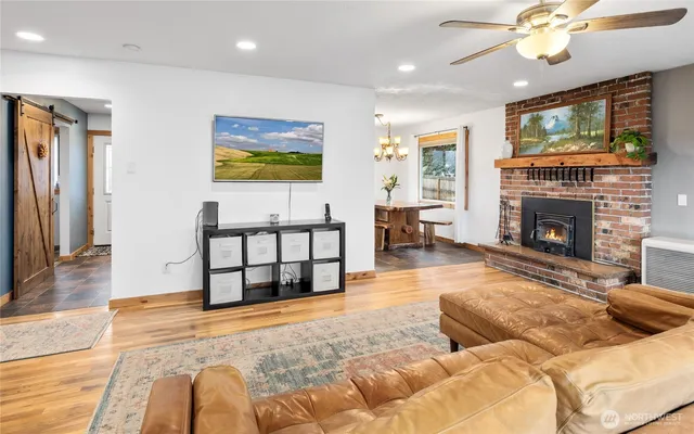 a bed room with a bed and a chandelier