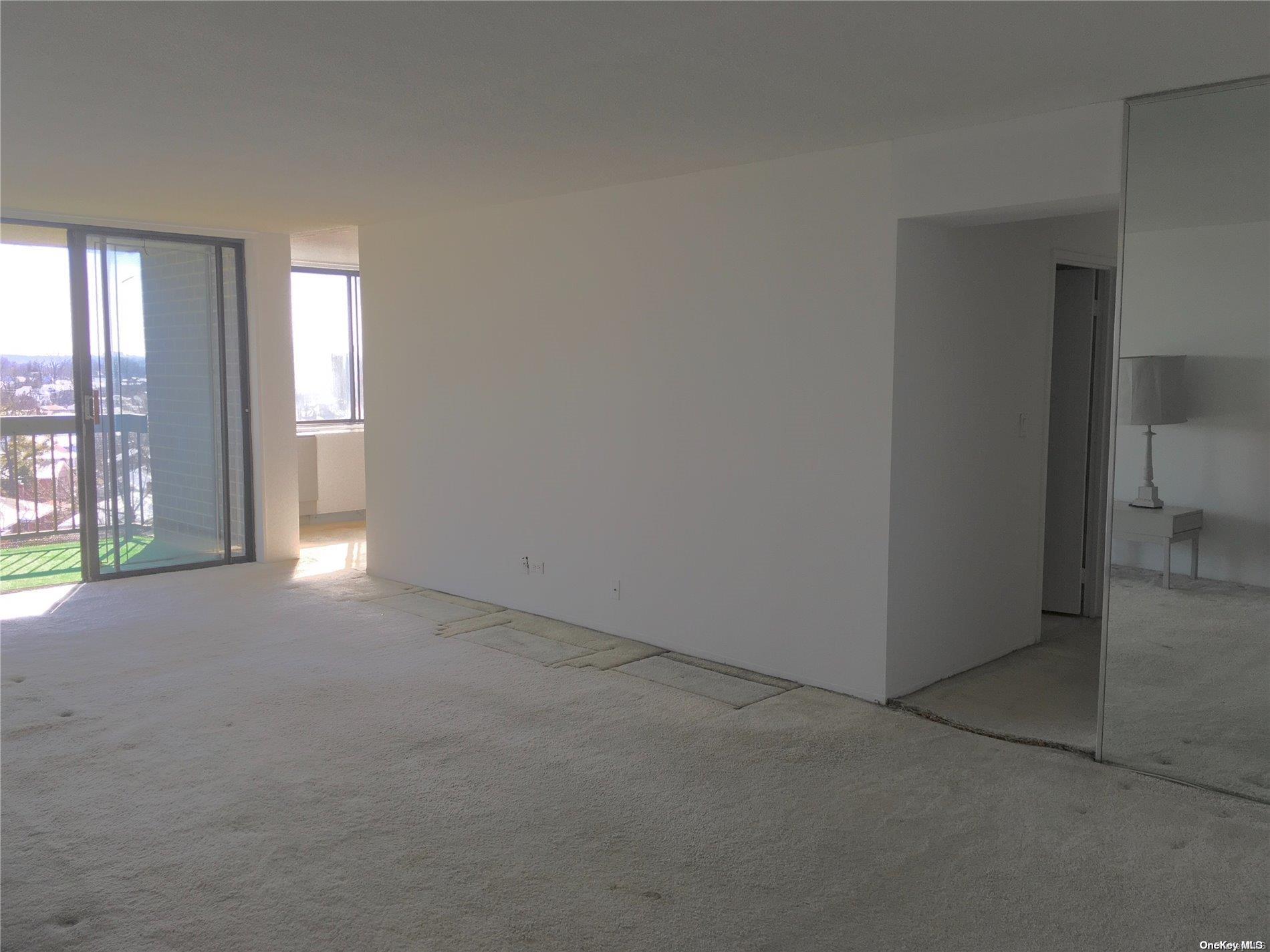 1 Bay Club Drive, Unit 9T Queens, NY 11360 - Photo 1 of 1 Living Room into D/R