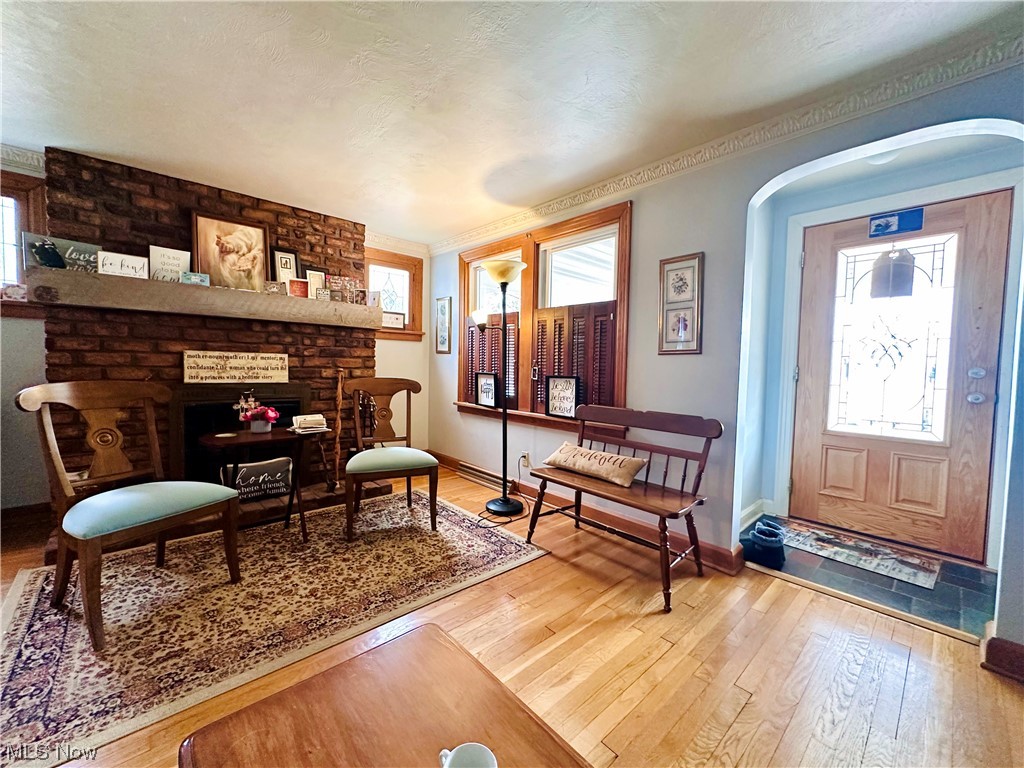 5175 Shields Road Canfield, OH 44406 - Photo 7 of 45 Living area featuring light hardwood / wood-style flooring and a fireplace