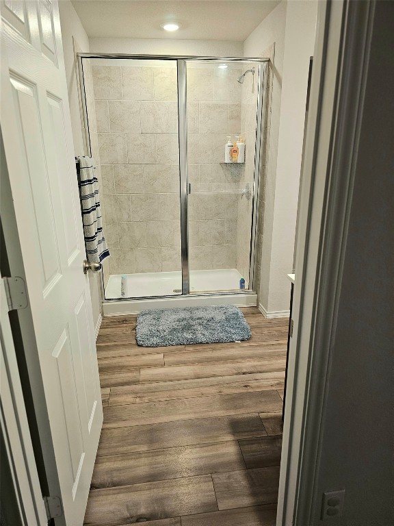 1124 Velvet Court Troy, TX 76579 - Photo 11 of 18 a bathroom with a granite countertop shower and a sink