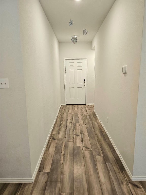 1124 Velvet Court Troy, TX 76579 - Photo 3 of 18 a view of a hallway with wooden floor