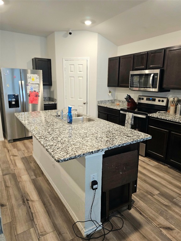 1124 Velvet Court Troy, TX 76579 - Photo 6 of 18 a kitchen with kitchen island granite countertop a sink appliances and cabinets