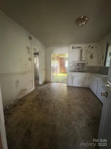 a view of a kitchen with a sink