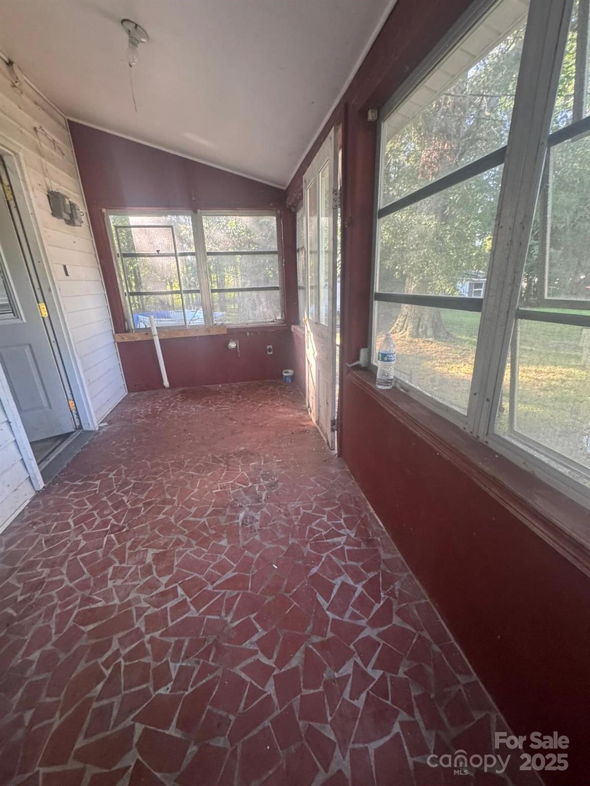 65 Maynard Avenue Ansonville, NC 28170 - Photo 10 of 14 a view of an empty room with a window