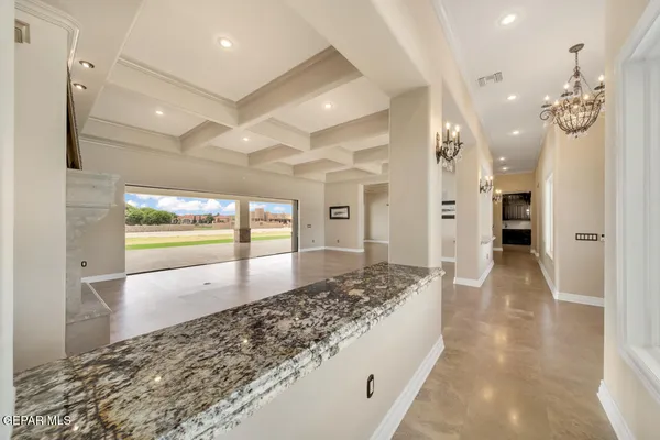 a kitchen with stainless steel appliances granite countertop a stove and a sink
