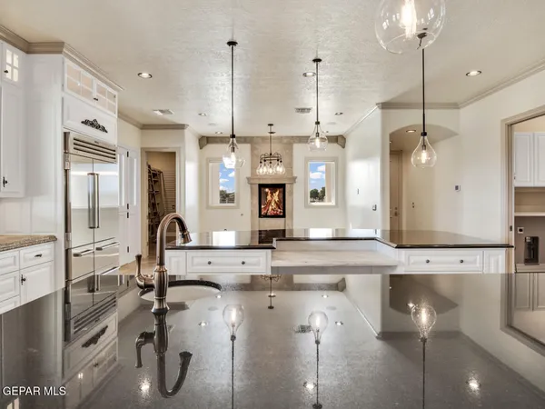 a spacious bathroom with a double vanity sink shower and a mirror