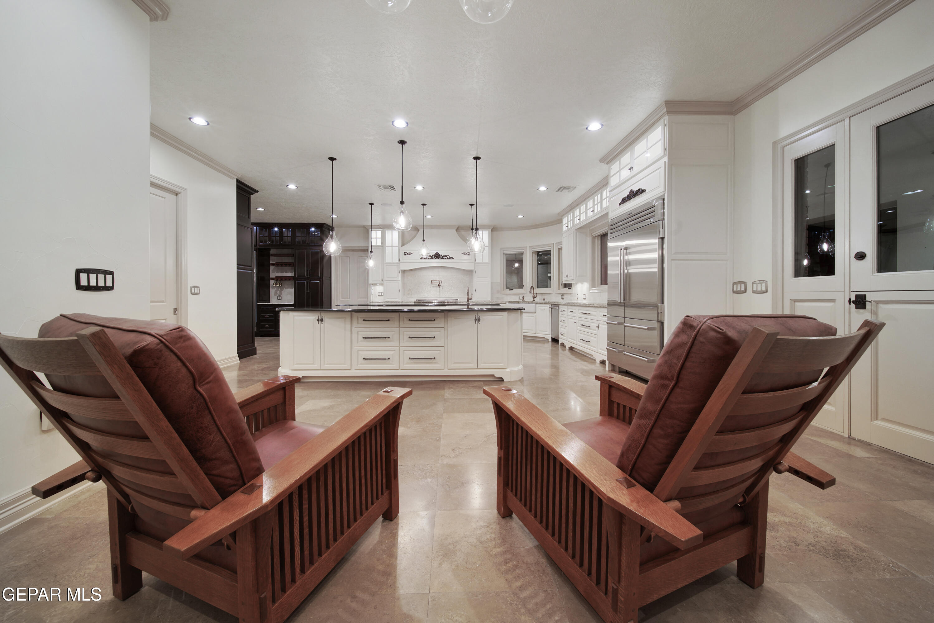 7 Cielo Del Este Anthony, NM 88021 - Photo 39 of 95 a living room with stainless steel appliances kitchen island granite countertop furniture and a kitchen view