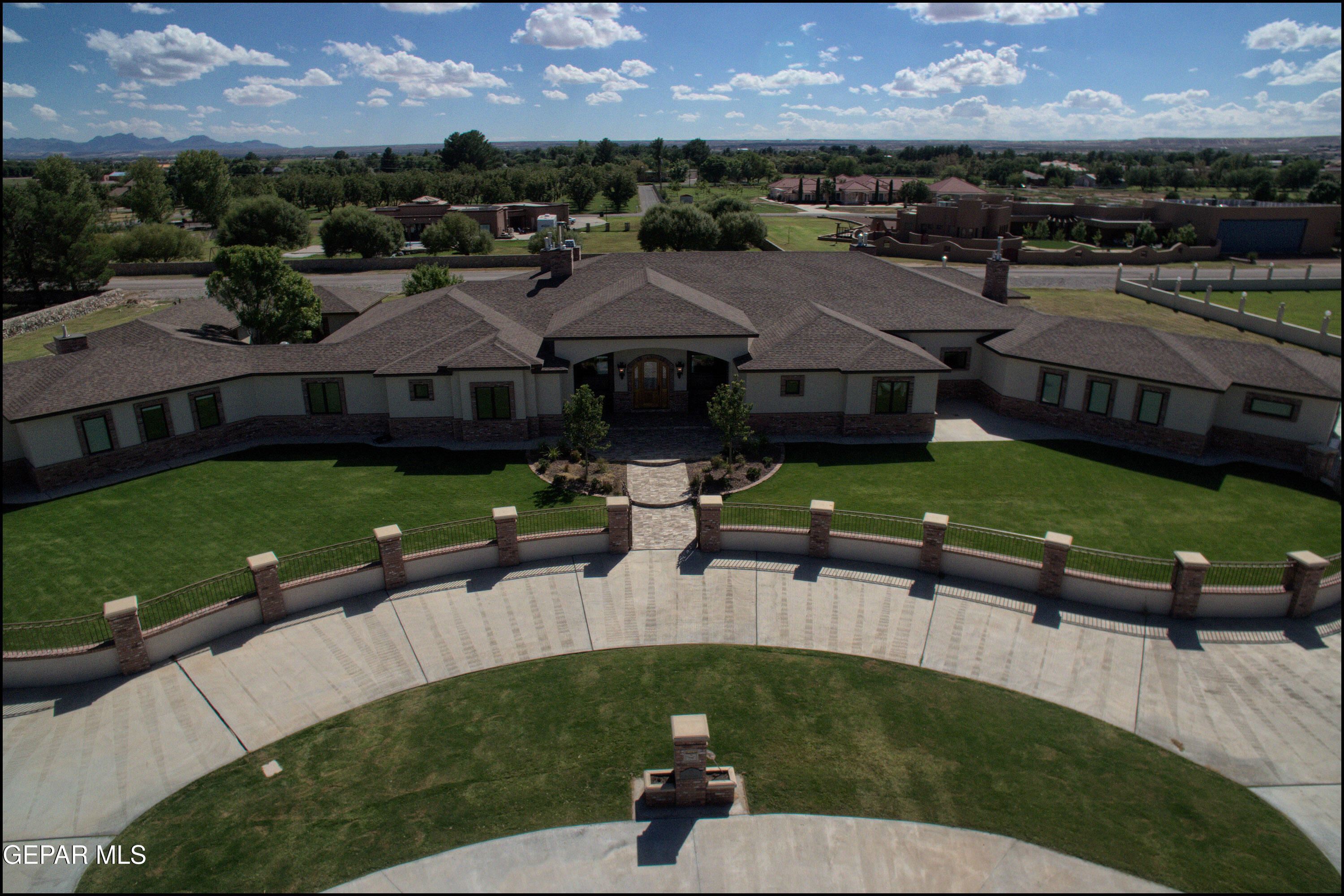 7 Cielo Del Este Anthony, NM 88021 - Photo 4 of 95 an aerial view of a house with garden space and street view