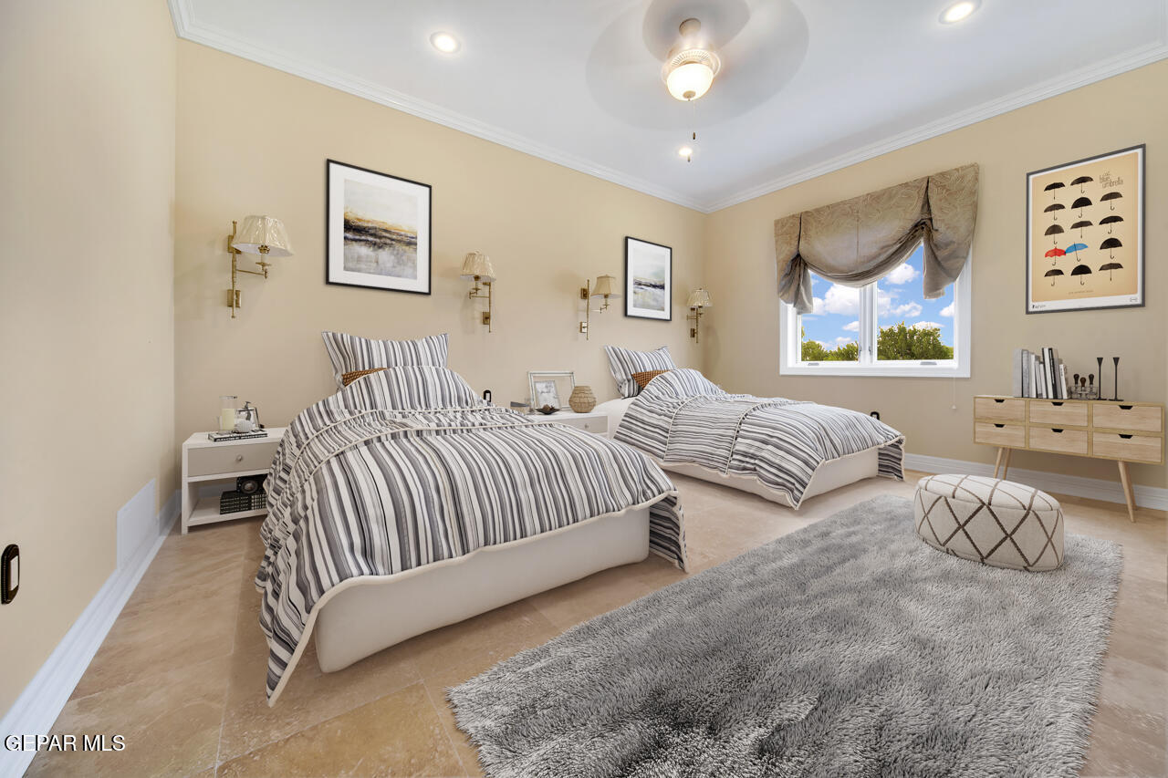 7 Cielo Del Este Anthony, NM 88021 - Photo 49 of 95 a spacious bedroom with two beds and painting on the wall