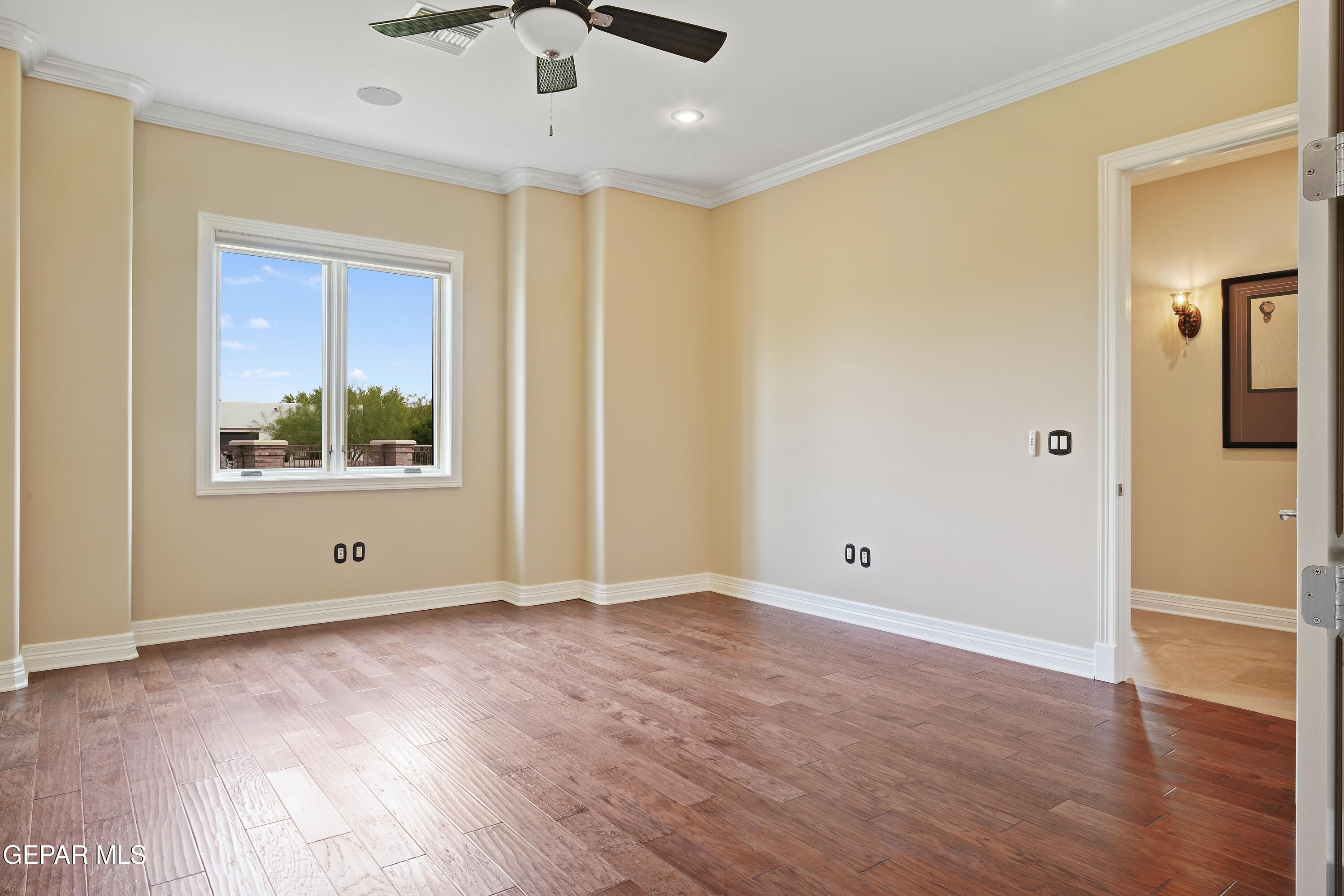 7 Cielo Del Este Anthony, NM 88021 - Photo 55 of 95 wooden floor in an empty room with a window