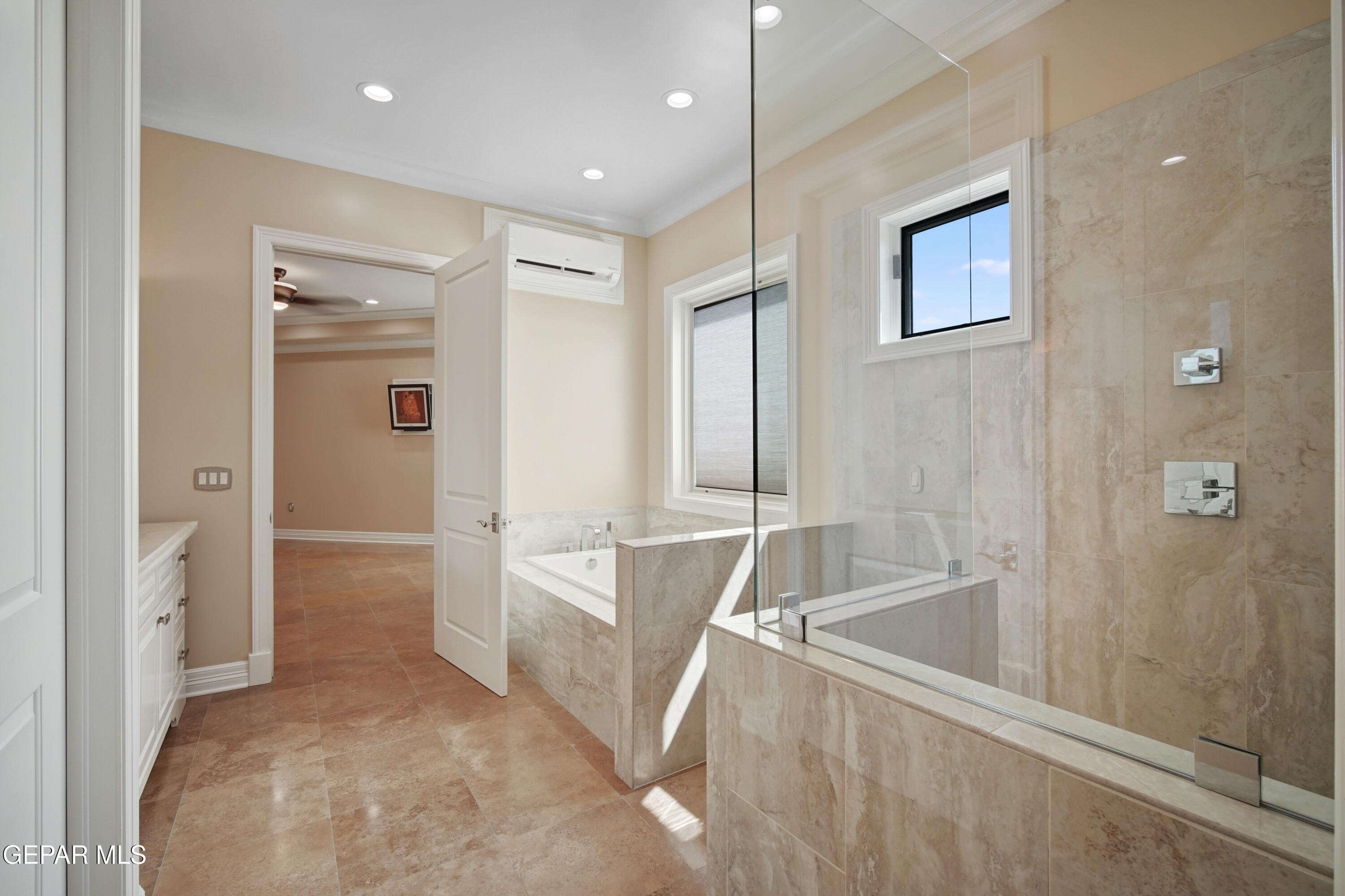 7 Cielo Del Este Anthony, NM 88021 - Photo 74 of 95 a bathroom with a tub a sink and a shower