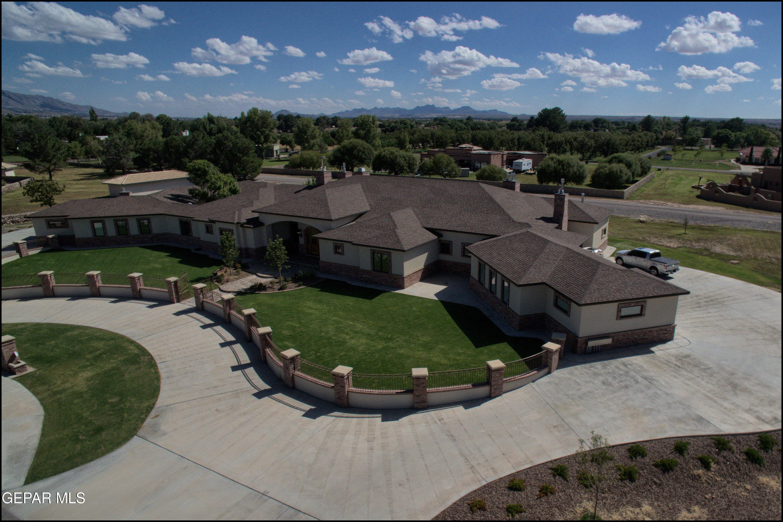 7 Cielo Del Este Anthony, NM 88021 - Photo 8 of 95 a view of a houses with a swimming pool