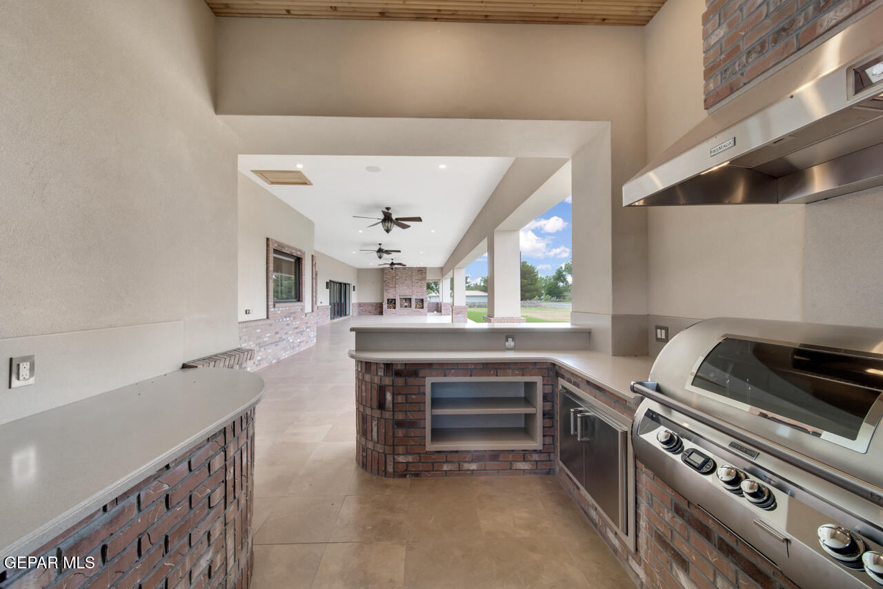 7 Cielo Del Este Anthony, NM 88021 - Photo 85 of 95 a kitchen with a stove and a sink