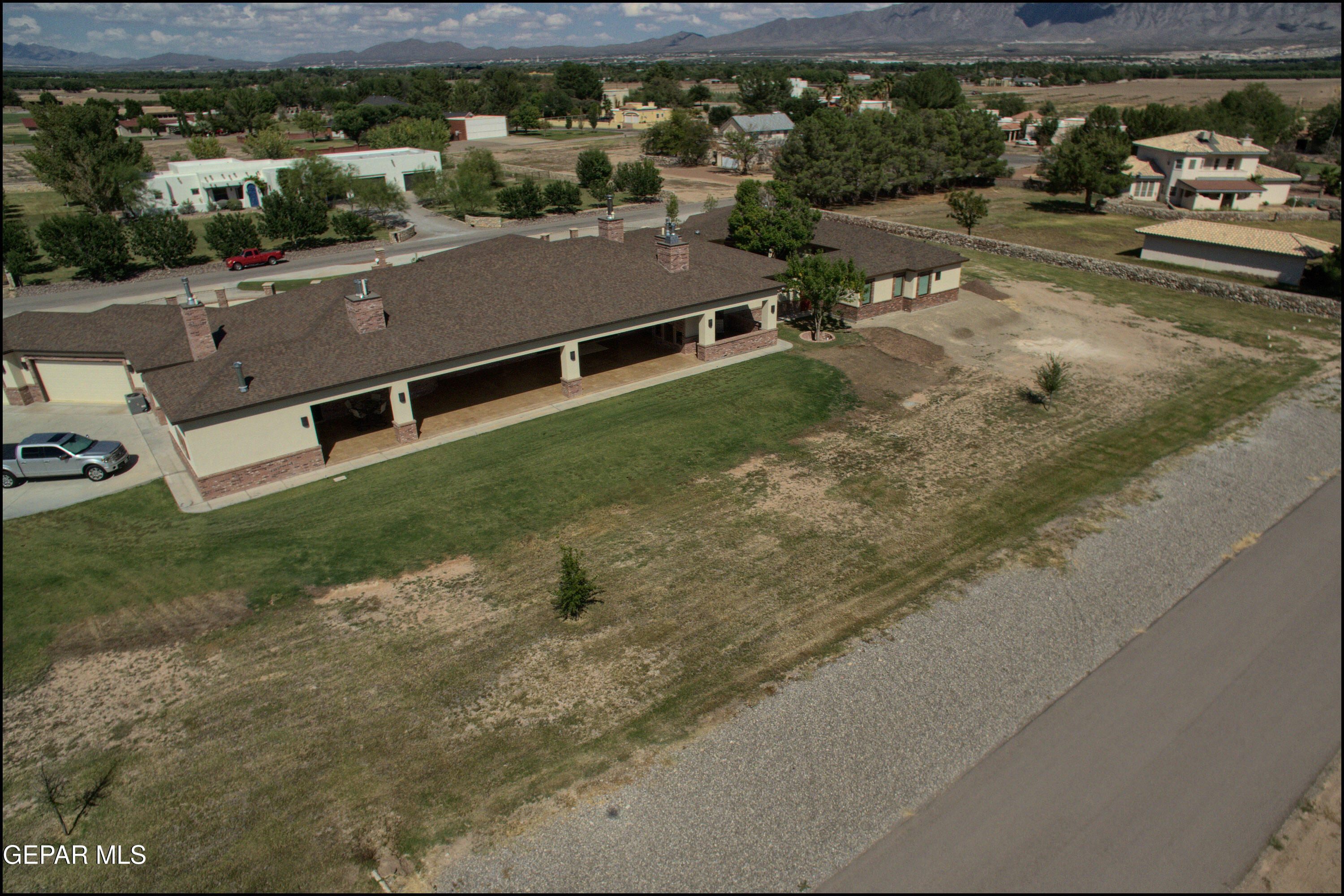 7 Cielo Del Este Anthony, NM 88021 - Photo 91 of 95 an aerial view of a house with a yard
