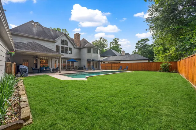 a view of a house with a swimming pool