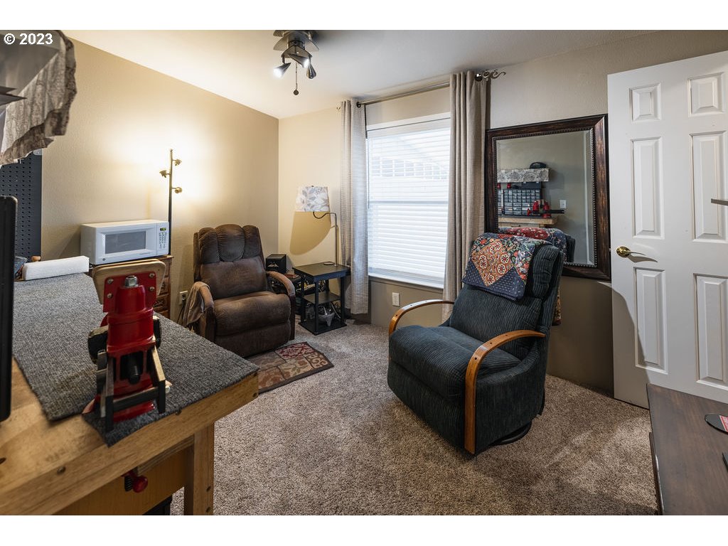 369 Gun Club Road, Unit 16 Woodland, WA 98674 - Photo 23 of 44 a living room with furniture