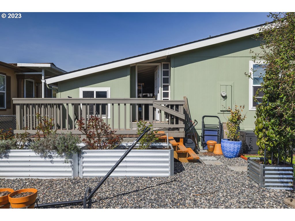 369 Gun Club Road, Unit 16 Woodland, WA 98674 - Photo 37 of 44 a view of house with a yard