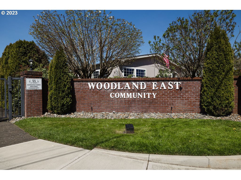 369 Gun Club Road, Unit 16 Woodland, WA 98674 - Photo 43 of 44 a view of a house with a yard