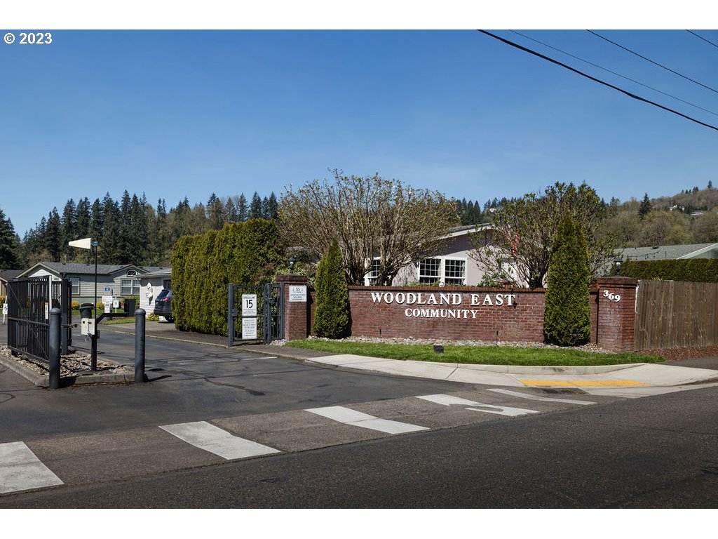 369 Gun Club Road, Unit 16 Woodland, WA 98674 - Photo 44 of 44 a view of a park with a bench