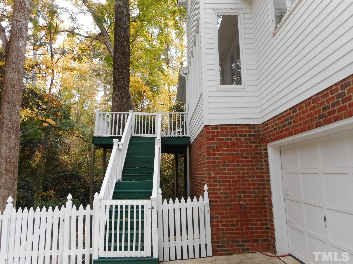 1205 Weldon Place Raleigh, NC 27608 - Photo 14 of 33 a front view of a house with a yard