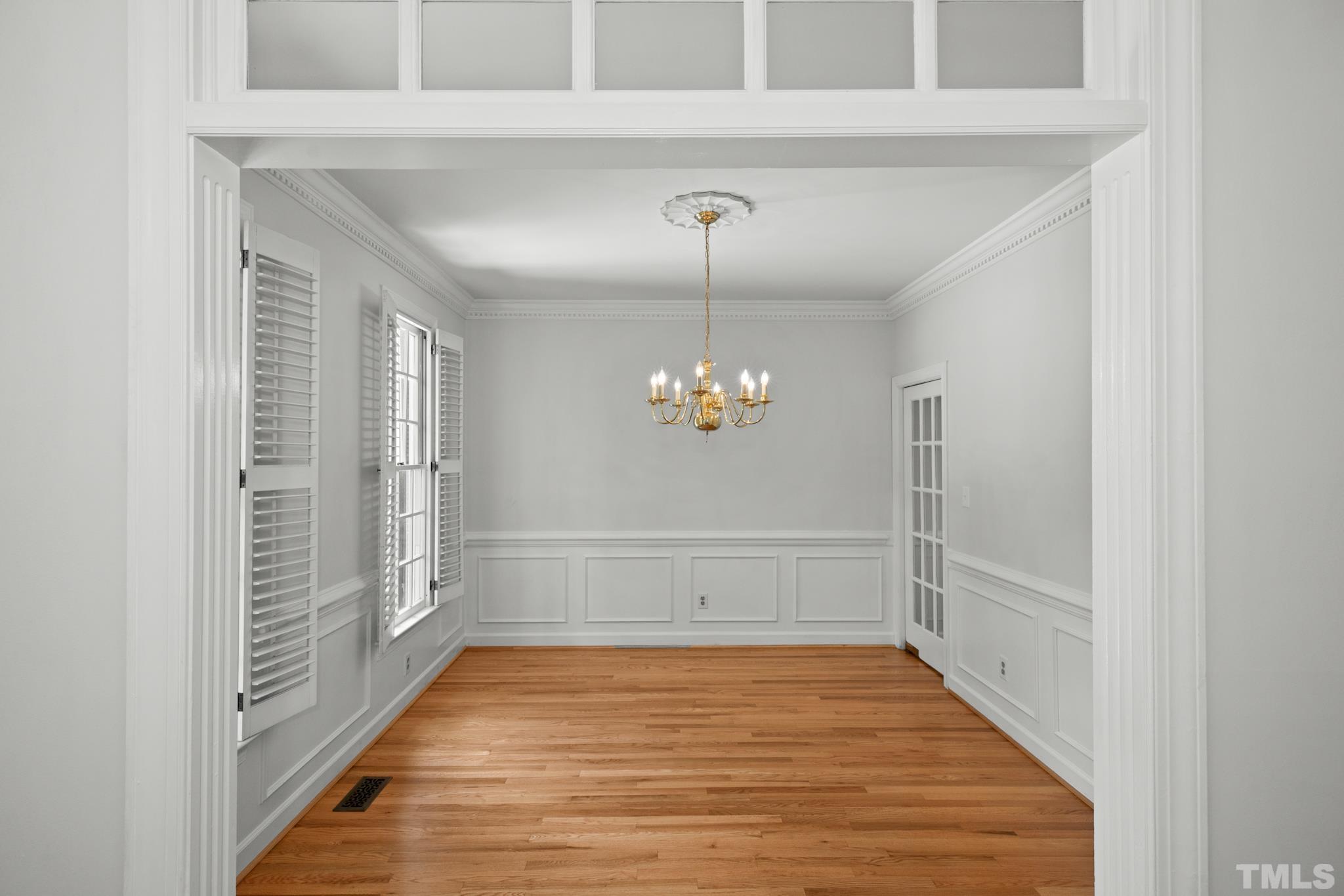 1205 Weldon Place Raleigh, NC 27608 - Photo 16 of 33 a view of empty room with wooden floor