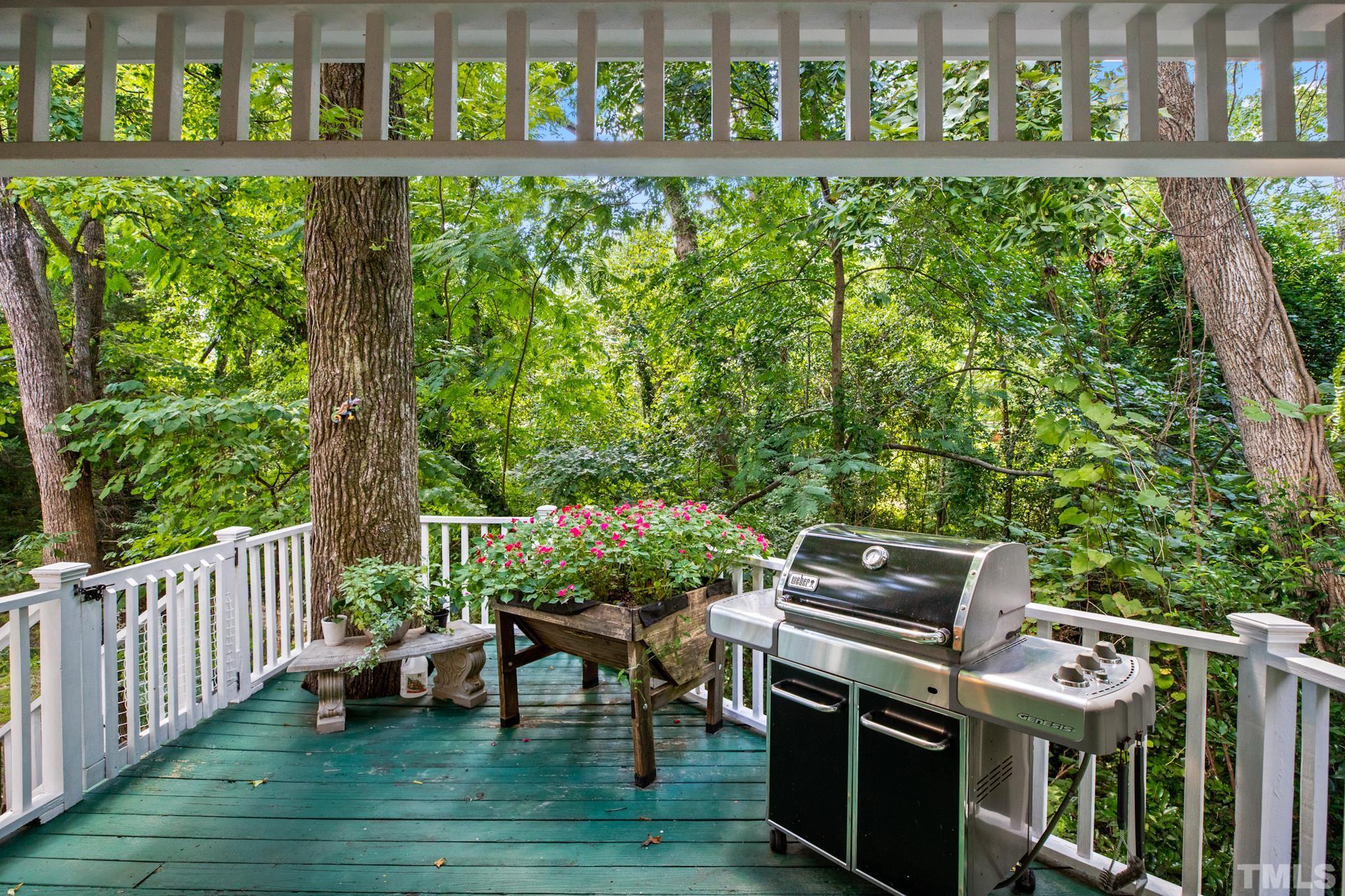 1205 Weldon Place Raleigh, NC 27608 - Photo 22 of 33 a view of a chairs and table in the balcony