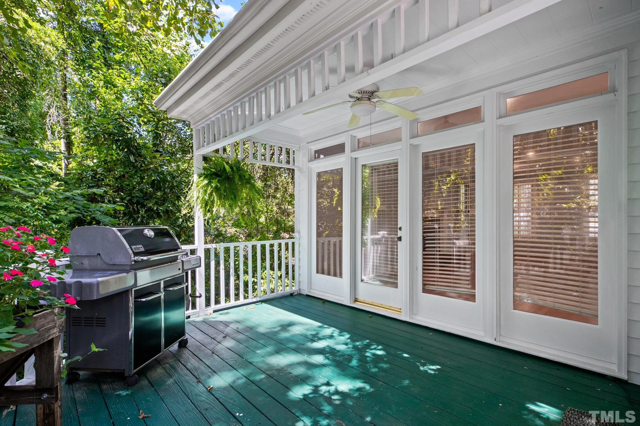 1205 Weldon Place Raleigh, NC 27608 - Photo 23 of 33 a view of a house with backyard and porch