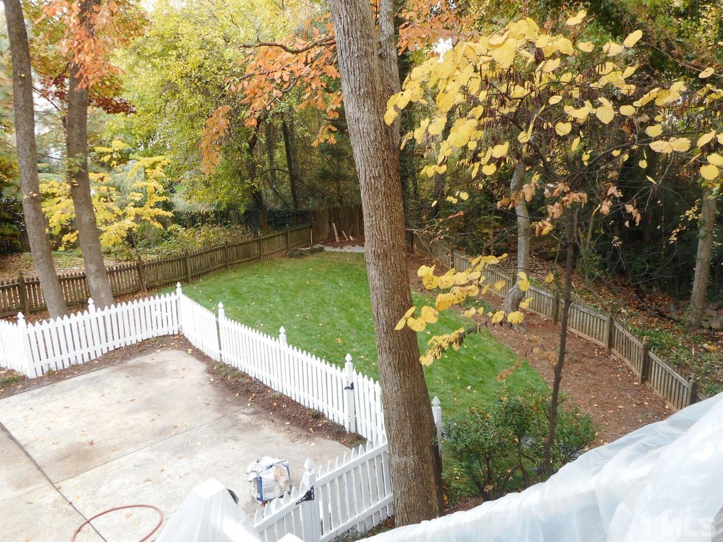 1205 Weldon Place Raleigh, NC 27608 - Photo 10 of 33 a view of a backyard