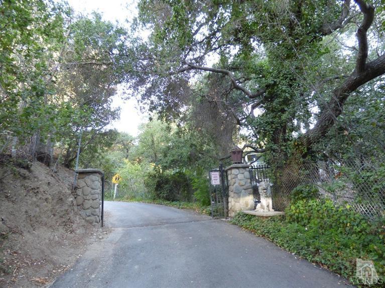 952 Riess Road Simi Valley, CA 93063 - Photo 23 of 25 a pathway of a building with large trees