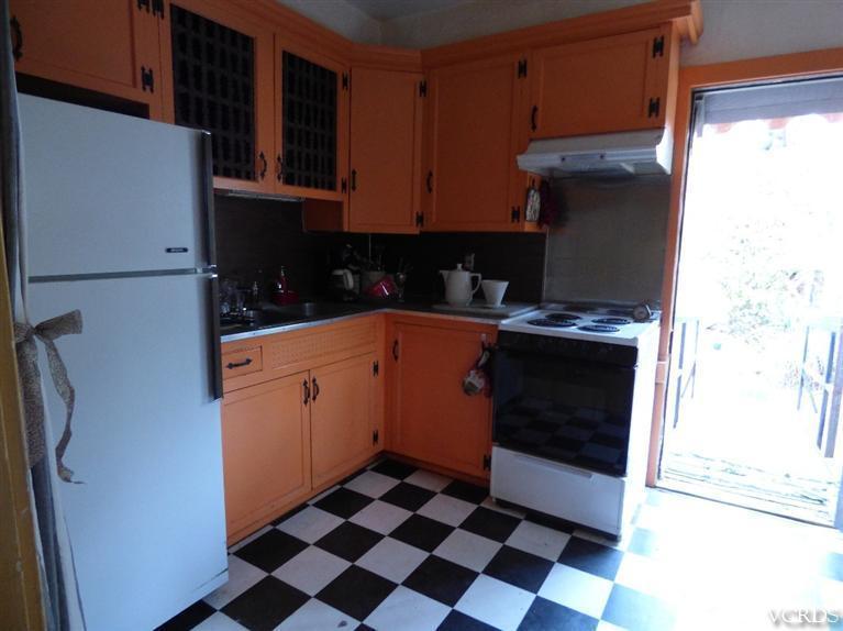 952 Riess Road Simi Valley, CA 93063 - Photo 7 of 25 a kitchen with stainless steel appliances granite countertop a refrigerator and a stove