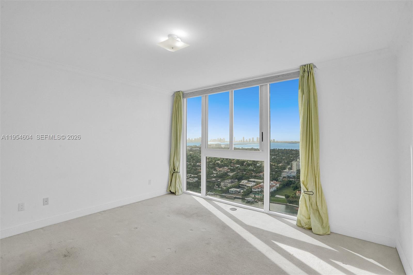 4775 Collins Avenue, Unit 3007 Miami Beach, FL 33140 - Photo 28 of 60 a view of room with window