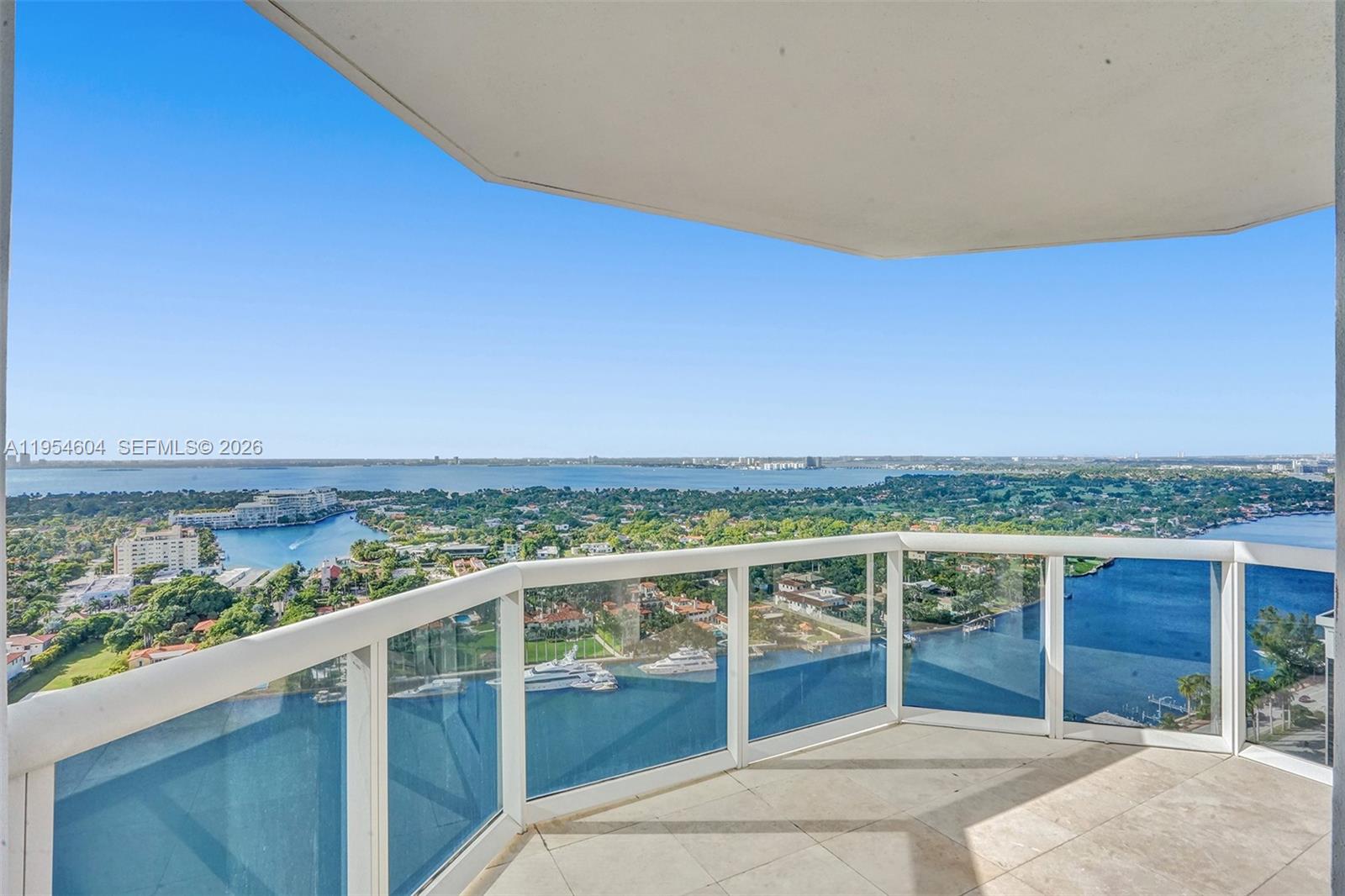 4775 Collins Avenue, Unit 3007 Miami Beach, FL 33140 - Photo 6 of 60 a view of a city from a balcony