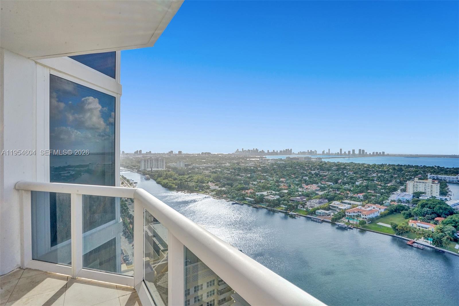 4775 Collins Avenue, Unit 3007 Miami Beach, FL 33140 - Photo 10 of 60 a view of a city from a balcony