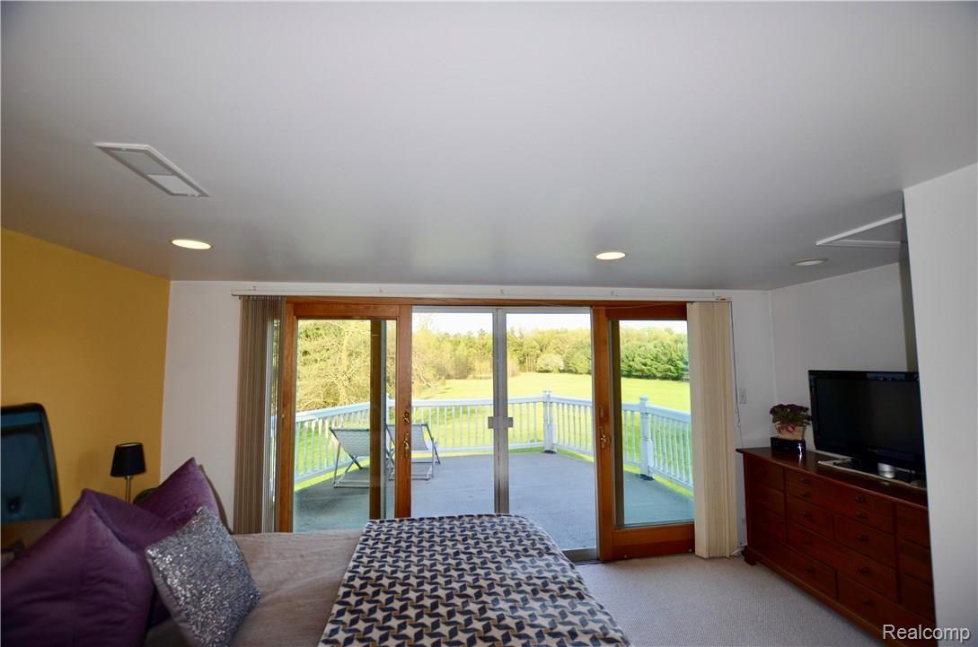 13327 Fagan Road Holly, MI 48442 - Photo 27 of 37 Terrace and view from Master Bedroom. Sunrise views