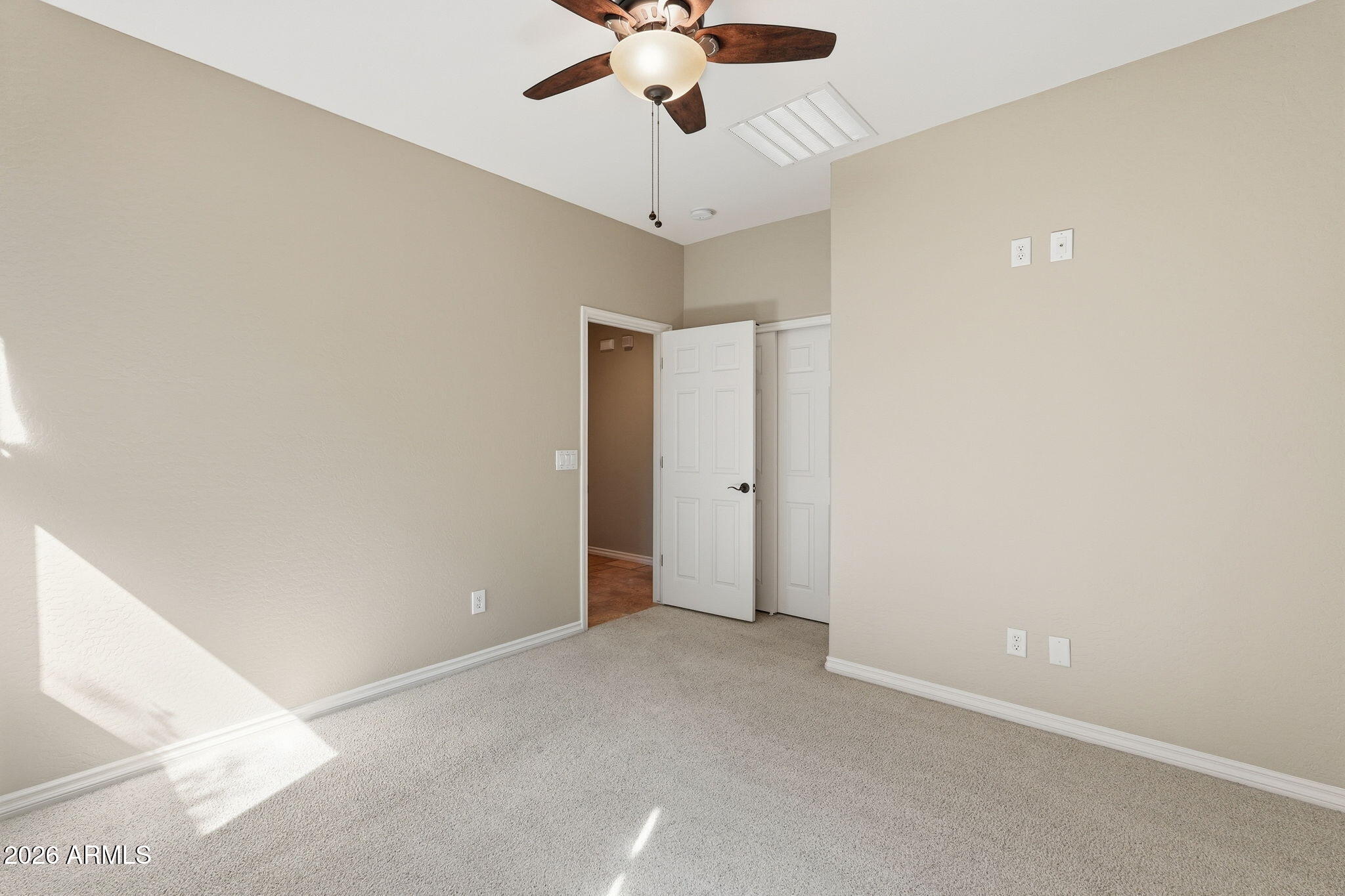 1694 East Grand Ridge Road Queen Creek, AZ 85140 - Photo 32 of 61 a view of an empty room
