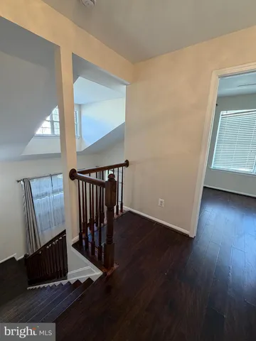 a view of a livingroom with wooden floor