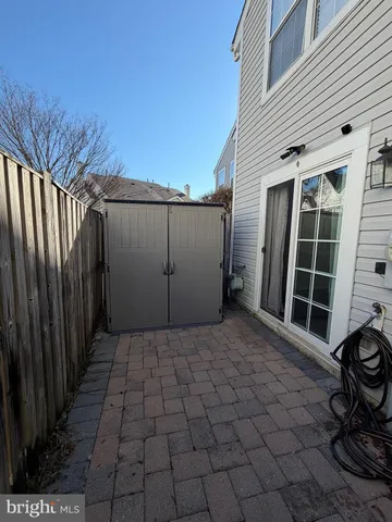 a view of a house with backyard and porch