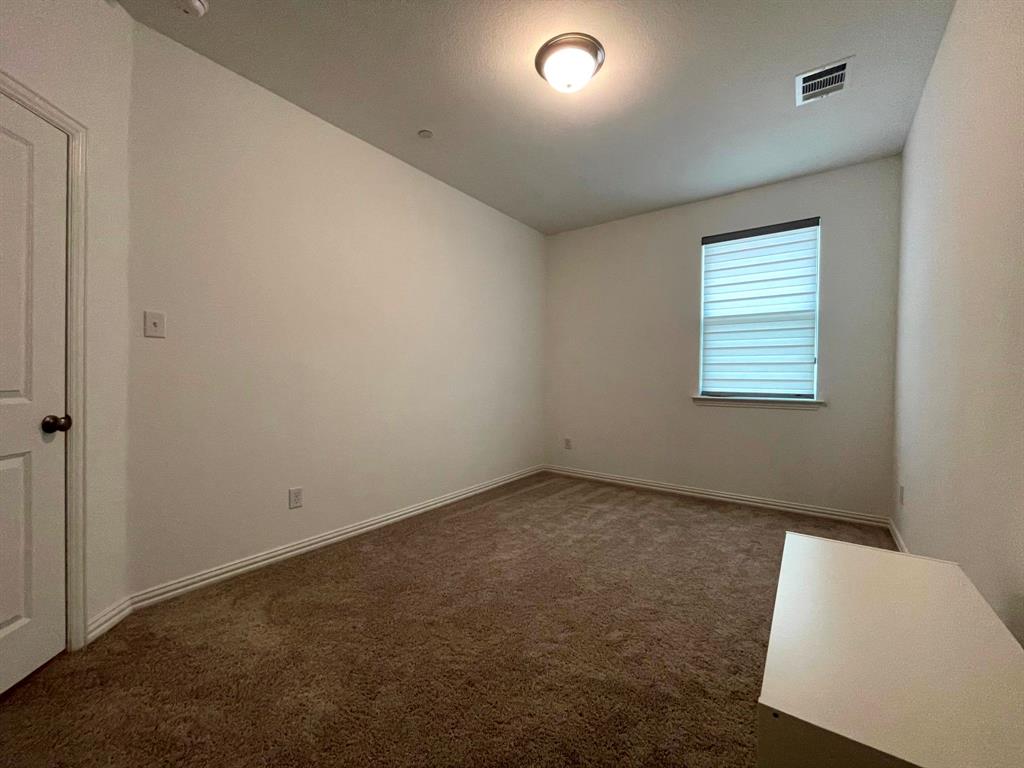 5514 Union Street Sachse, TX 75048 - Photo 21 of 25 an empty room with a window