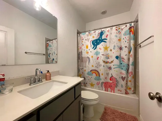 a room with furniture and a gate