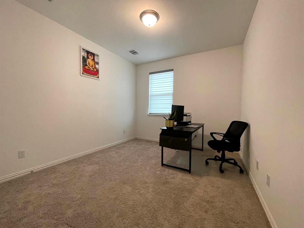 5514 Union Street Sachse, TX 75048 - Photo 24 of 25 a room with furniture and a gate