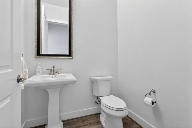 a bathroom with a sink and a toilet