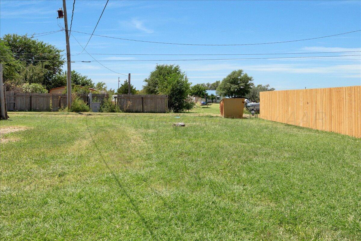 607 Groom Avenue Panhandle, TX 79068 - Photo 18 of 18 a backyard of a house with lots of green space