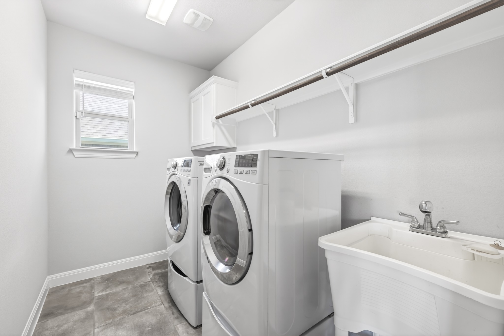 4105 Haight Street Round Rock, TX 78681 - Photo 32 of 40 a utility room with dryer and washer