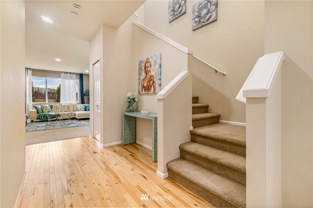 4114 167th Place Southeast Bothell, WA 98012 - Photo 20 of 38 a view of entryway and hall with wooden floor
