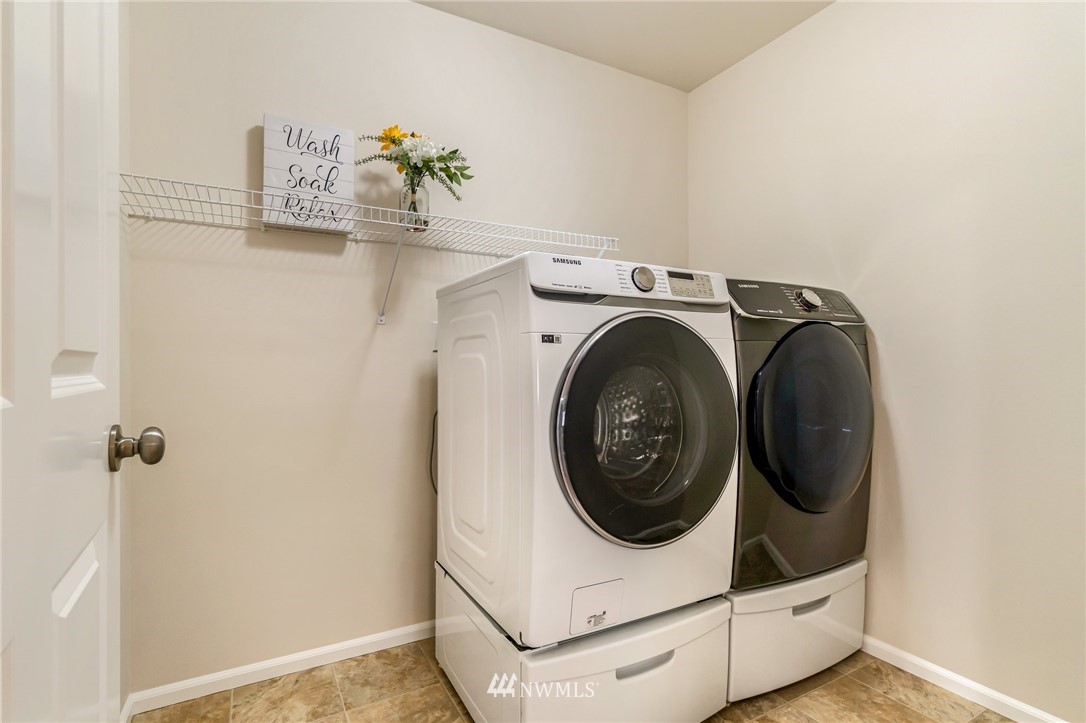 4114 167th Place Southeast Bothell, WA 98012 - Photo 32 of 38 a utility room with dryer and washer