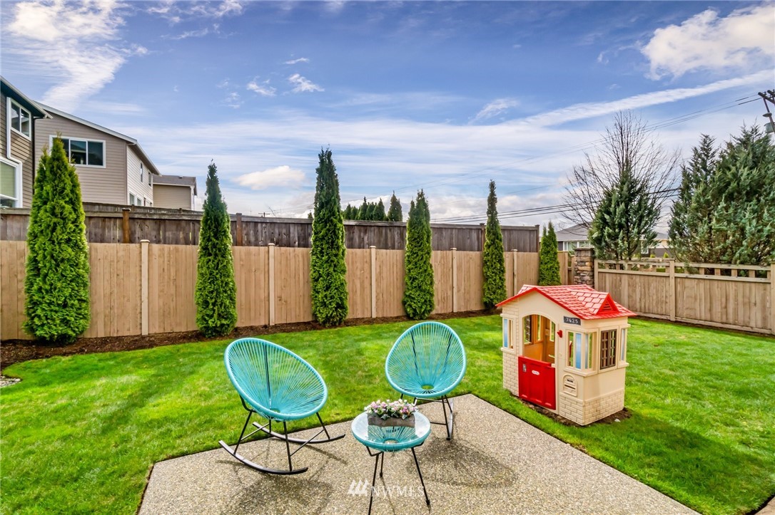 4114 167th Place Southeast Bothell, WA 98012 - Photo 33 of 38 a view of a chair in backyard of the house