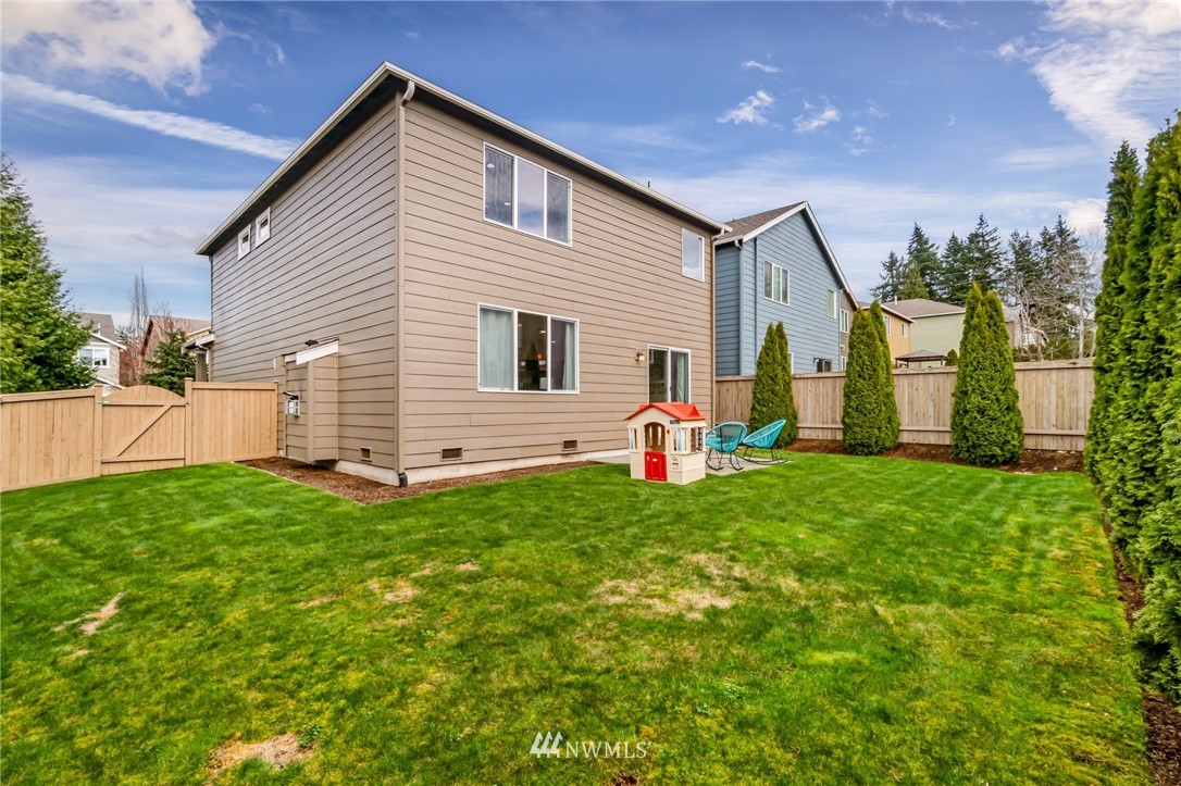 4114 167th Place Southeast Bothell, WA 98012 - Photo 35 of 38 a front view of house with yard and seating area