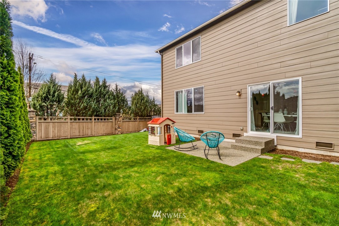 4114 167th Place Southeast Bothell, WA 98012 - Photo 37 of 38 a view of a house with backyard and sitting area